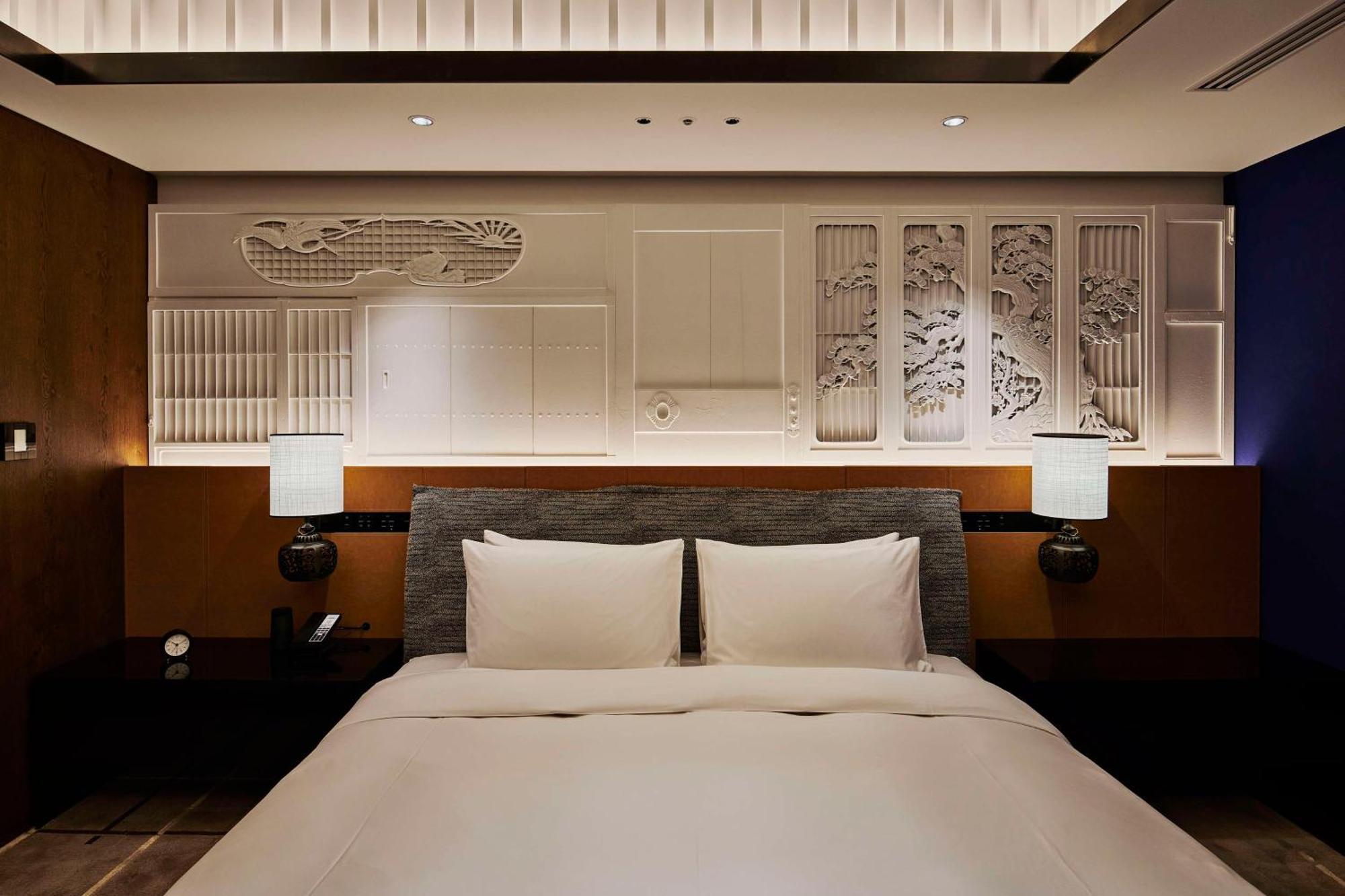 Hyatt Centric Kanazawa Esterno foto A bedroom at the hotel